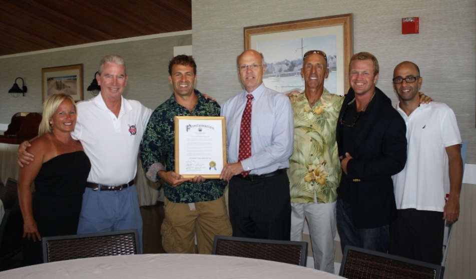 Freeholder Deputy Director Gary J. Rich, Sr. (center) presents a proclamation recognizing the Monmouth County lifeguard team who were crowned national champions at the Nautica USLA Lifeguard Championships. Pictured left to right: Denise Blair, Monmouth County U.S. Lifesaving Association (MC USLA) Treasurer, Gene Hession, MC USLA  President, Mike Tomaino, Team Coach and MC USLA Communications Officer, Freeholder Rich, Jim Simonelli, MC USLA Secretary, Team Coach Jack Green and Mike Barrows, MC USLA Vice President.